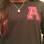 "A" Long sleeved Crew Neck Black Size L Photo 1