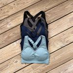 Women's Sports Bras 4 Pack Navy, Blue, Grey Black Size M. NWOT Size M Photo 2