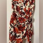 Free People Floral Wrap Mini Dress
Size Small Photo 0