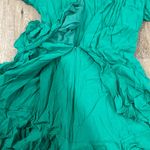 Vestique  small green ruffled romper. Ties on side Photo 1