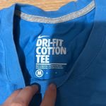Nike Women’s  dri fit blue top size medium Photo 1