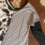 Amazon Cow print top from  size medium Photo 1