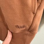 TNA Sweatfleece Cozyfleece Mega Fit Mock neck sweatshirt brown orange size 2 Size M Photo 3
