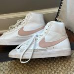 Nike  blazer sneakers girls size 5.5. Only wore once minor, flaw besides that in perfect condition. Color:light pink/white  Photo 0