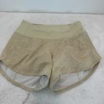 Lululemon Speed Up Mid-Rise Short 4"
Gravel Dust Dew Green Multi / Dew Green 2 Photo 1