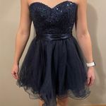 Sean Collection Strapless Sweetheart Cut Crystal Short Ruffle Homecoming Dress Photo 0