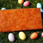 Nicole Lee new wallet in orange vegan leather. Photo 0