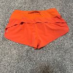 Lululemon  Athletica Bright Orange Athletic Shorts Photo 1