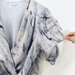 Amanda Uprichard  deep V-neck ruffle mini dress Photo 4