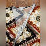 Eye Candy  Geometric Wrap Blouse in Black, Brown, and Gold Photo 5