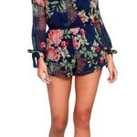 Lulus Run Away With Me Navy Blue Floral Print Long Sleeve Romper Photo 1