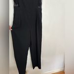 Romeo + Juliet Couture Sheer Lace Panel Cut Out Short Sleeve Jumpsuit. Photo 3