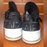 Nike  Black and Gold Sneakers Photo 1