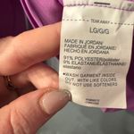 Under Armour NWT Women’s Purple  long sleeve top. Size large. Cold Gear fitted. Photo 10