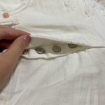 Free People  We the Free Distressed White Denim Cutoff Shorts Photo 4