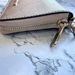 Michael Kors Jet Set Travel Metallic Leather Smartphone Wristlet in Pale Gold Photo 6