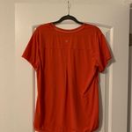 Tangerine  ladies athletic top.  Size: L.  Good condition! Photo 2
