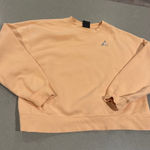 Jordan Sweatshirt Women's Small Peach Crew Neck Pullover Loose Fit activewear Photo 0