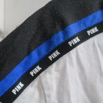 PINK Victoria's Secret tie up lace neckline pink on sleeves short sleeve shirt in white and black size large. Photo 9