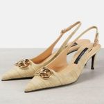 Dolce & Gabbana
Logo-embellished raffia slingback pumps Photo 7