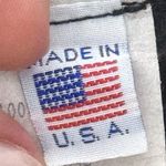 This fitted dress features a striped print. The dress has a sweetheart neckline Black Photo 8