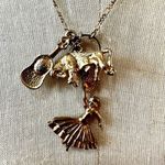 Gold tone flamenco dancer, bull, guitar charm necklace Photo 1