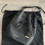 Kenneth Cole  Vintage Black Perforated Drawstring Bucket Bag Shoulder Purse Photo 1