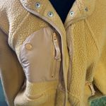 Free People Movement Free People Hit The Slopes cream and tan Sherpa snap jacket woman’s size S Photo 1