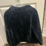 Elegant black faux fur jacket. Perfect for a chic look. Photo 2