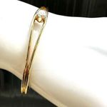 Gold tone open cuff rhinestone bracelet Photo 1