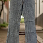 Bebe ‎ Jeans Women's Size 27 Raw Hem Flared Denim Light Wash Photo 0
