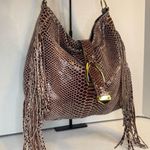 G.I.L.I.Snake Fringe Stirrup Shoulder Red/Brown Patent Suede Bag. Photo 2