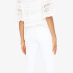Alexis  Valetin Crochet Fringe Off The Shoulder Crop Top in White Photo 2