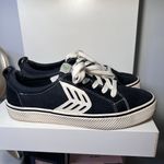 Cariuma Black Canvas Sneakers‎ with White Stripe Detail & Green Inner Sole Photo 5