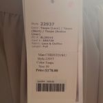 Christina Wu NWT--TWO PIECE TAUPE FORMAL SET-SIZE 10 Stunning lace sleeveless top, fully lined, buttons down the back, long flowy skirt, fully lined, back zip, a beautiful two piece set, perfect for wedding, prom, any formal occasion, brand new with tags. Measurements: Top: Bust: armpit to armpit 20 inches  Length: shoulder seam to bottom 17 inches  Skirt: Waist: side to side 15 inches  Length: waistband to bottom 45 inches Photo 8