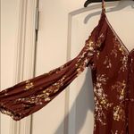 ASTR NWT Floral cold shoulder long sleeve romper Photo 1