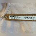 SKIMS NWT  Cotton Fleece Shrunken Zip Up Hoodie w/ flaw XS Photo 6