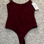 Buff bunny Bodysuit Size Medium  Photo 0