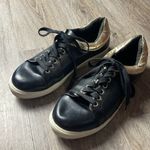 Torrid Black and Gold Sneakers Photo 1