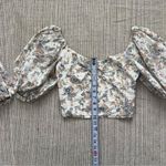 Abercrombie & Fitch floral patterned puff sleeve top with circle cut out Photo 3