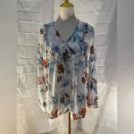 Moda Luxe  Blue and White Floral V-Neck Bishop Sleeve Blouse Photo 1