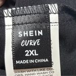 SheIn  Black Peplum Fitted Short Sleeve Blouse Photo 1