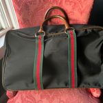 Classic Travel Bag with Leather Handles and Buckle Detail Black Photo 2