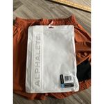 Alphalete  Woman’s Infinity Stride Short W/ Liner - Sour Tangerine, Size Small Photo 12