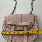EXPRESS Pink Grommet Bow Crossbody Bag Purse Chain Photo 3