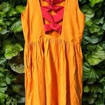 W118 By Walter Baker  size large Rylan dress orange with pink criss cross back Photo 1