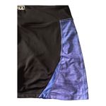 FILA Black & blue athletic skort, has a pocket in the waistband, excellent condition, size medium Measurements: Waist: side to side 16-19 inches Length: waistband to bottom 13 1/2 inches Photo 2