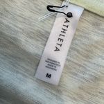Athleta  Light Yellow V-Neck Women's Tee shirt size Medium Photo 1