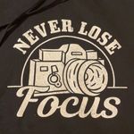 Unisex Brand new black and white hooded sweatshirt print “never lose focus” Photo 1