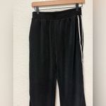 Oysho  Softstreme Feel Black Wide-Leg Pants with tuxedo woven striped down side Photo 5